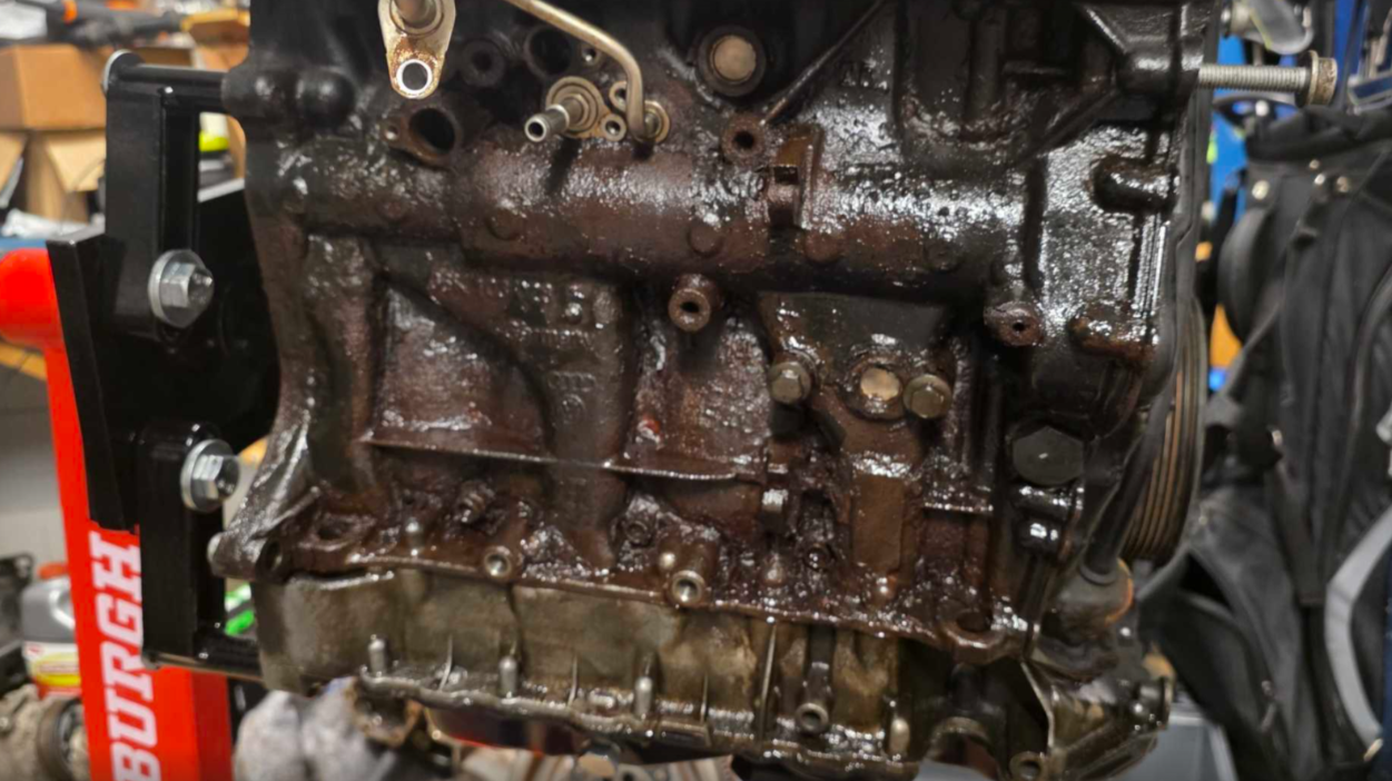 54937